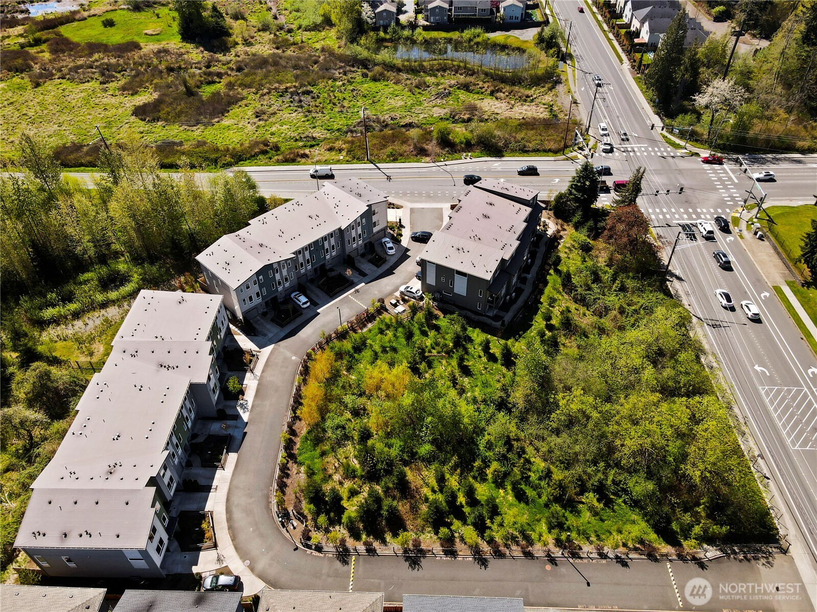 17905 35th Avenue Southeast, Unit A1 Bothell, WA 98012 - Photo 36 of 36 an aerial view of a house with a garden