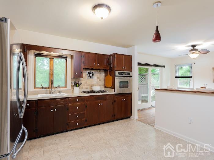 459 Milcrip Road Bridgewater, NJ 08807 - Photo 8 of 28 a kitchen with stainless steel appliances granite countertop a refrigerator and a sink