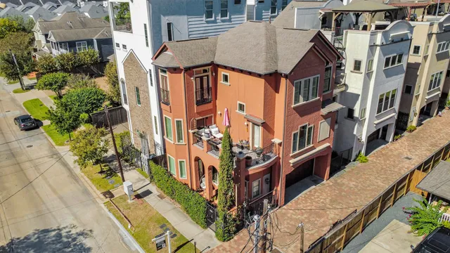a bedroom with a bed and ceiling fan