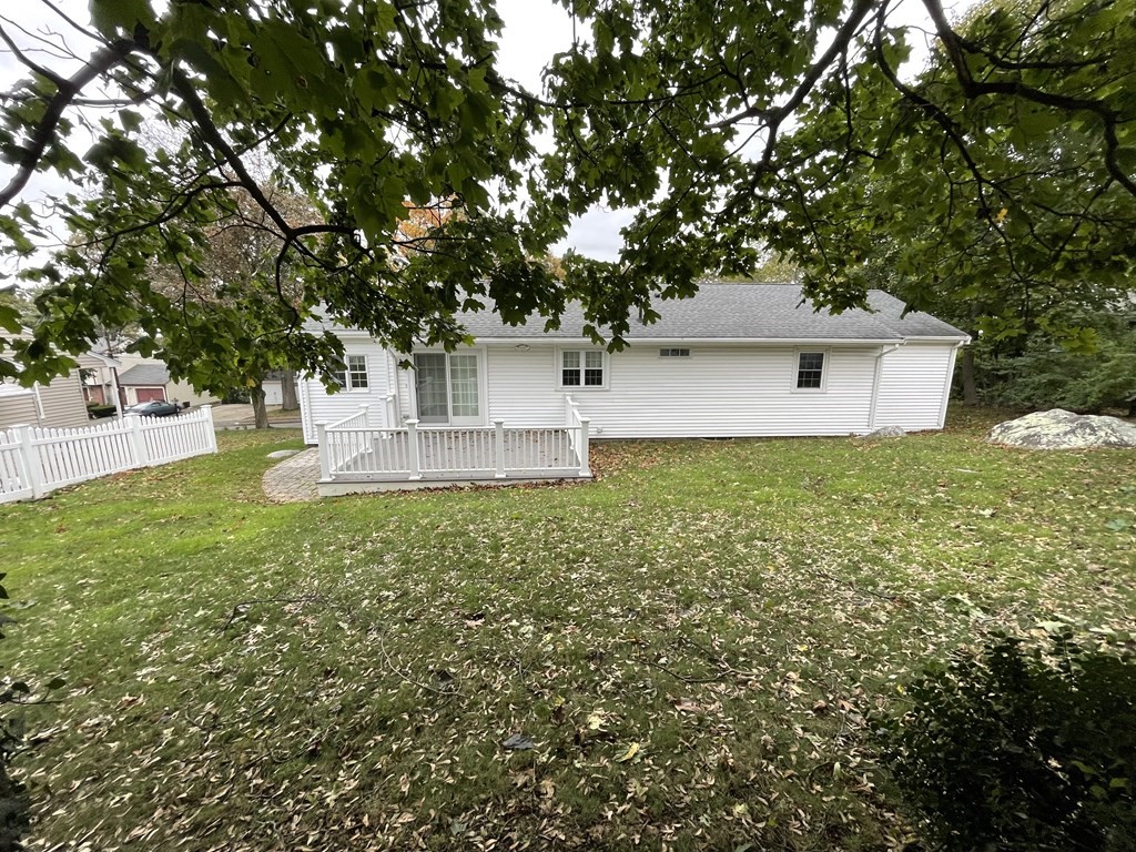 223 Governors Road Quincy, MA 02169 - Photo 7 of 40 a front view of a house with garden