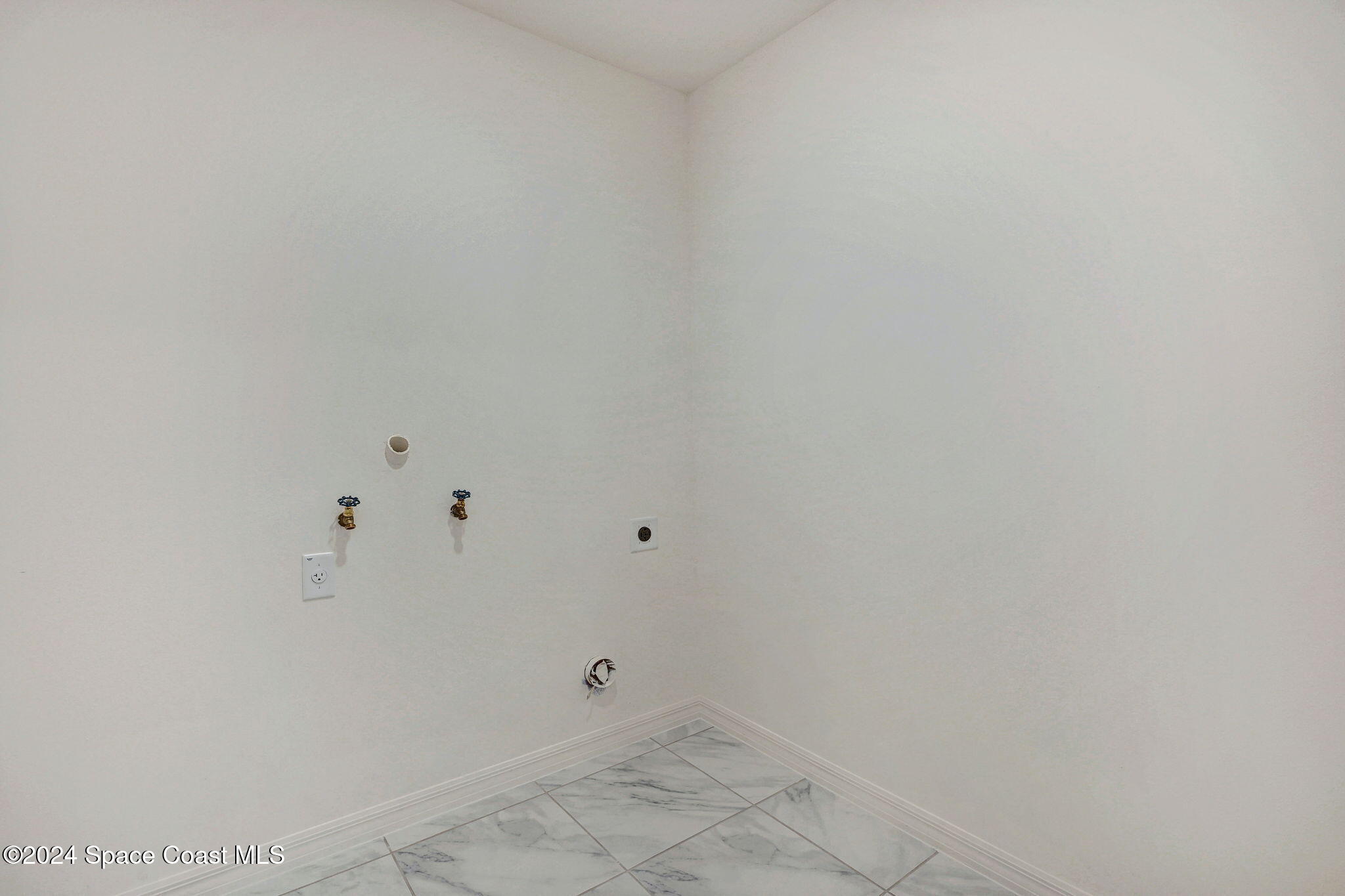 2939 Tishman Road Southeast Palm Bay, FL 32909 - Photo 27 of 34 Inside Laundry