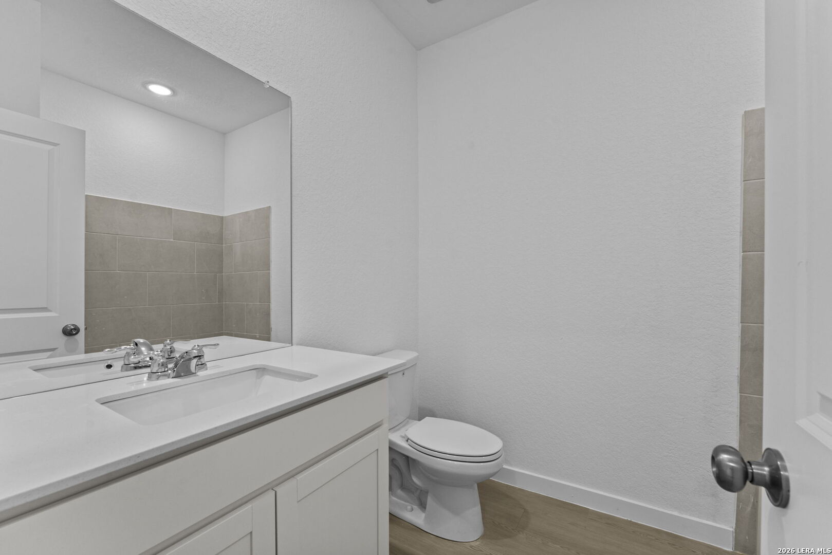 2319 Fort Davis Pass Marion, TX 78124 - Photo 5 of 24 a bathroom with a sink a toilet and mirror