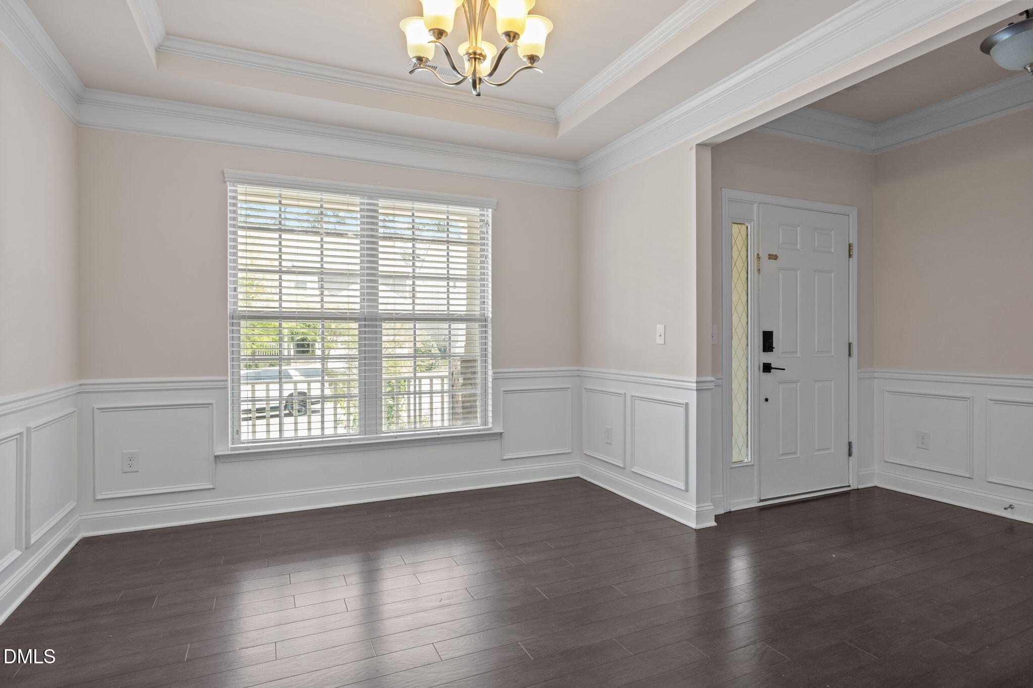 2048 Crampton Grove Way Cary, NC 27519 - Photo 16 of 50 a view of an empty room with wooden floor and a window