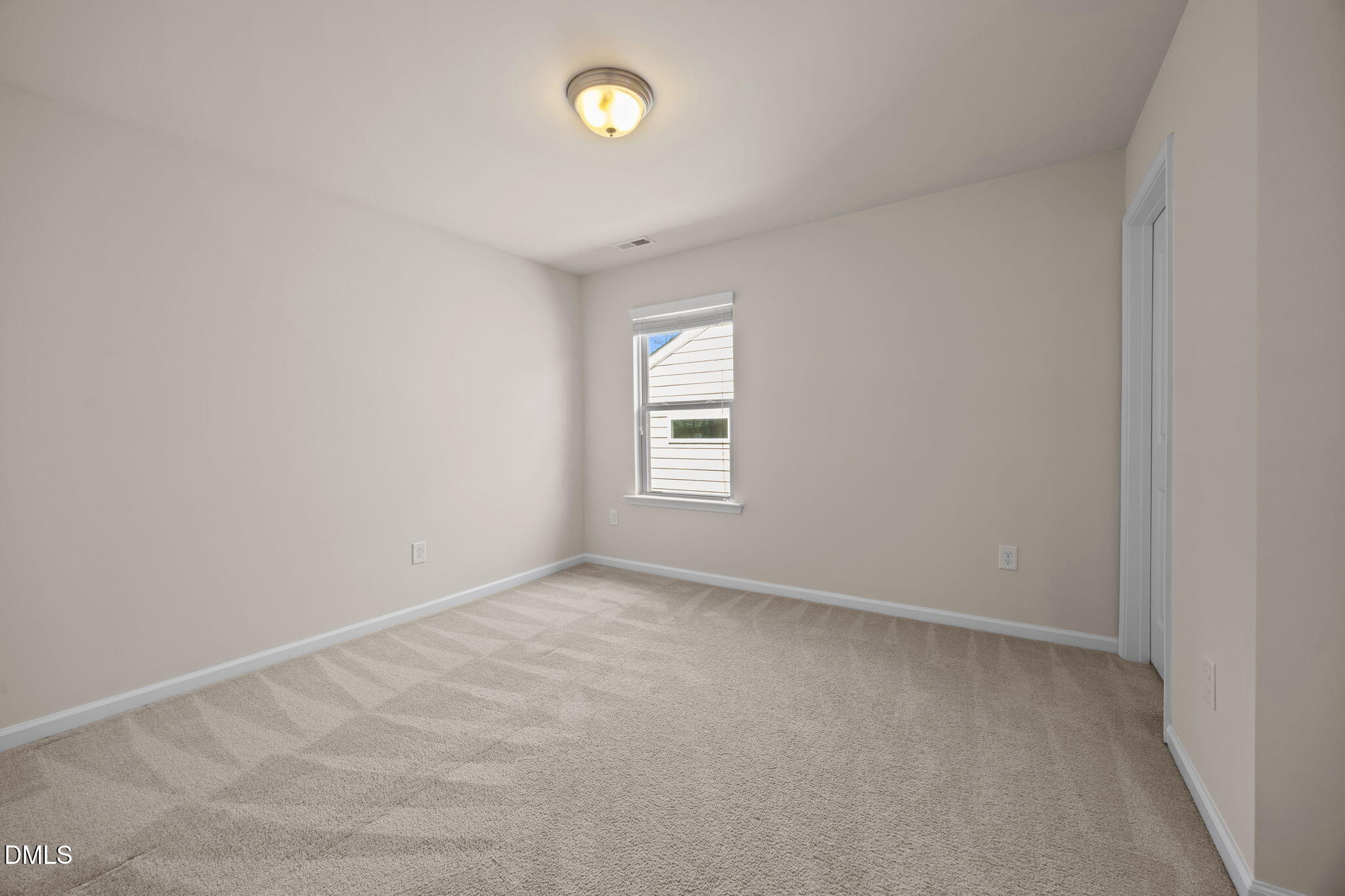 2048 Crampton Grove Way Cary, NC 27519 - Photo 29 of 50 an empty room with a window