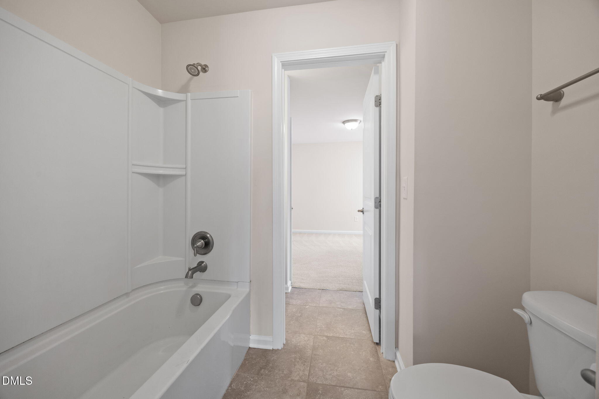 2048 Crampton Grove Way Cary, NC 27519 - Photo 32 of 50 a bathroom with a granite countertop toilet a sink and bathtub