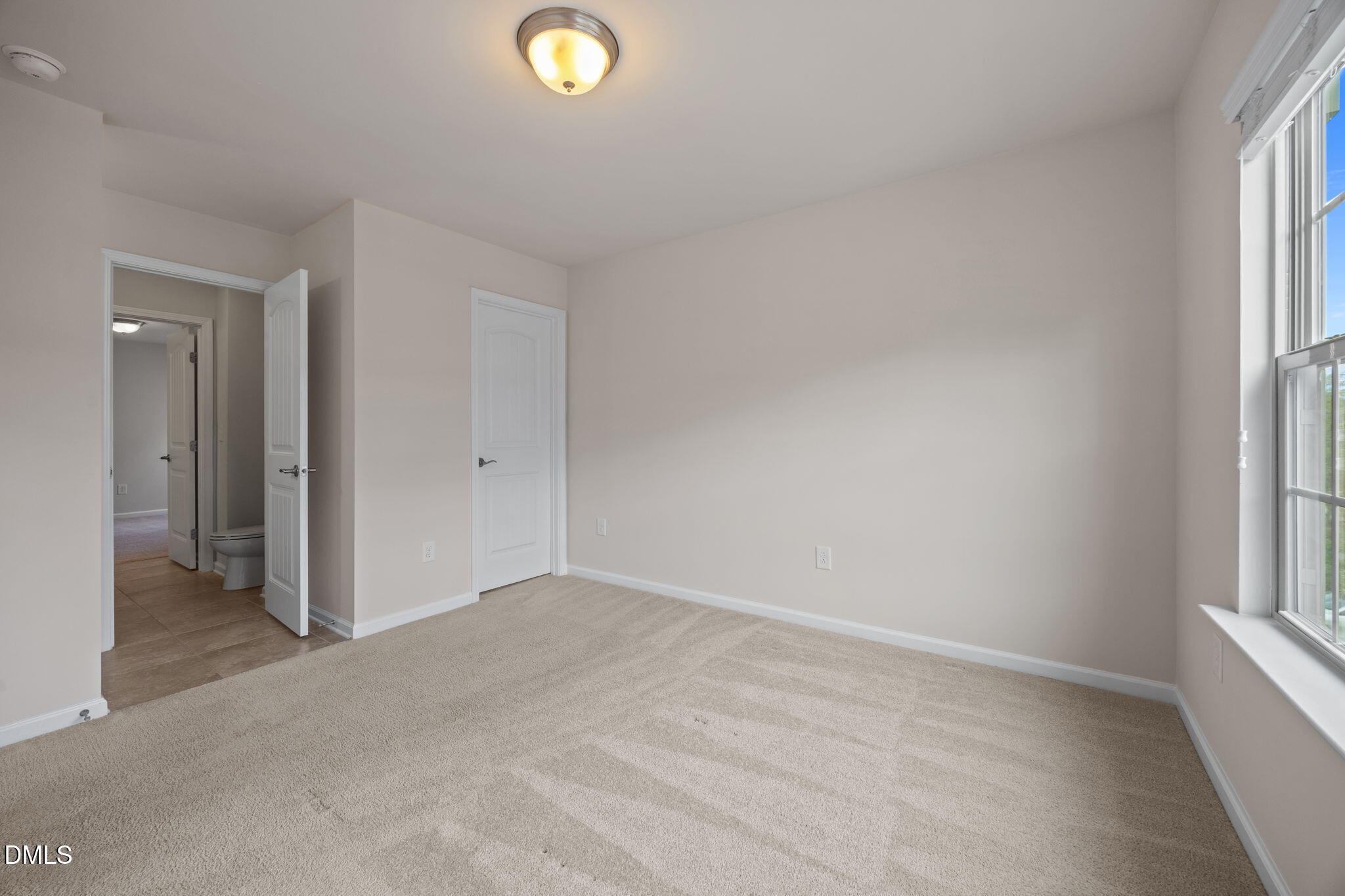 2048 Crampton Grove Way Cary, NC 27519 - Photo 35 of 50 an empty room with windows