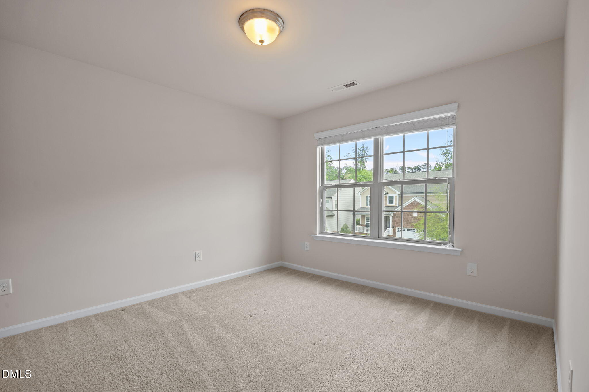 2048 Crampton Grove Way Cary, NC 27519 - Photo 36 of 50 an empty room with a window