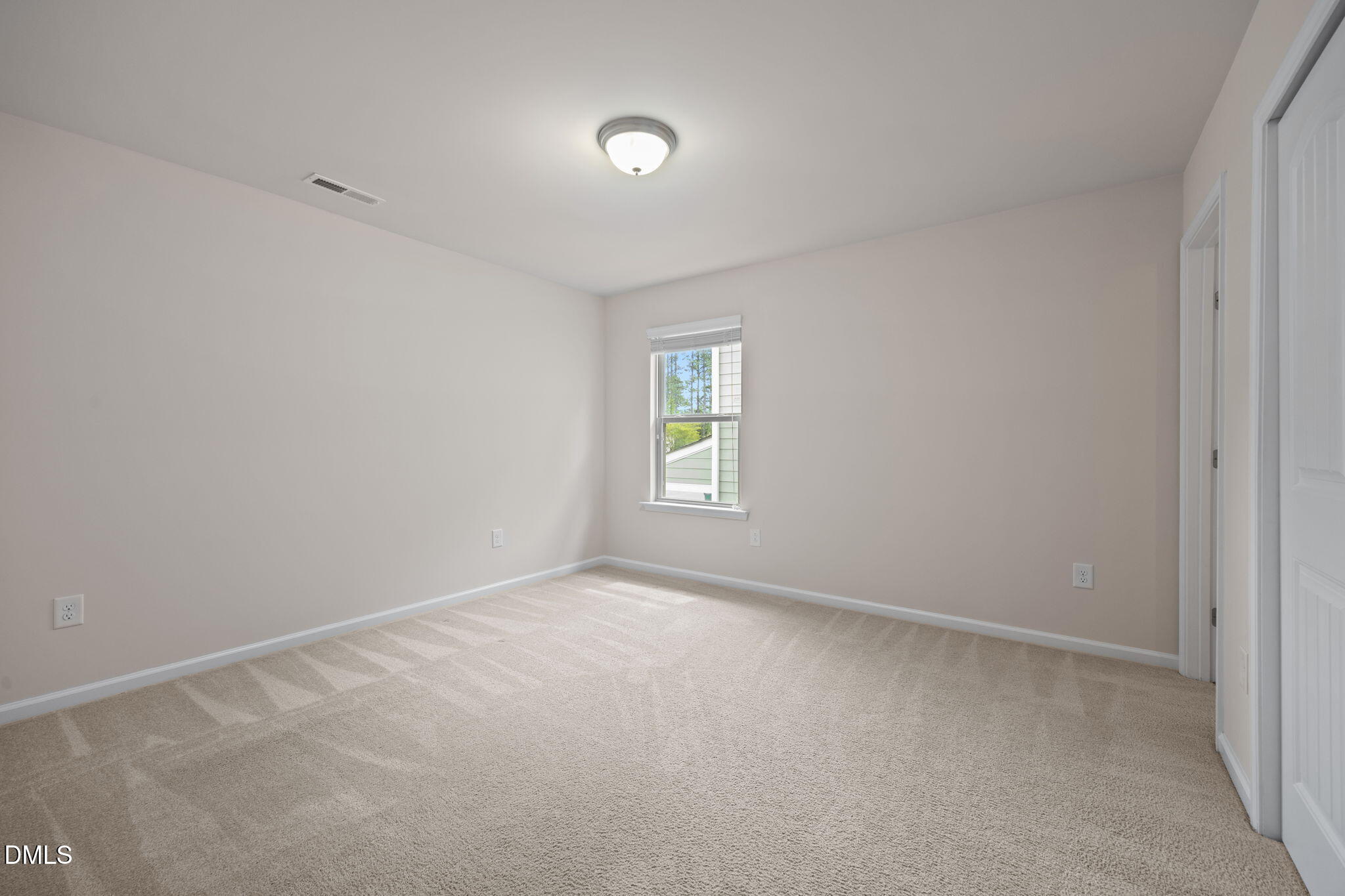 2048 Crampton Grove Way Cary, NC 27519 - Photo 40 of 50 a view of an empty room with a window