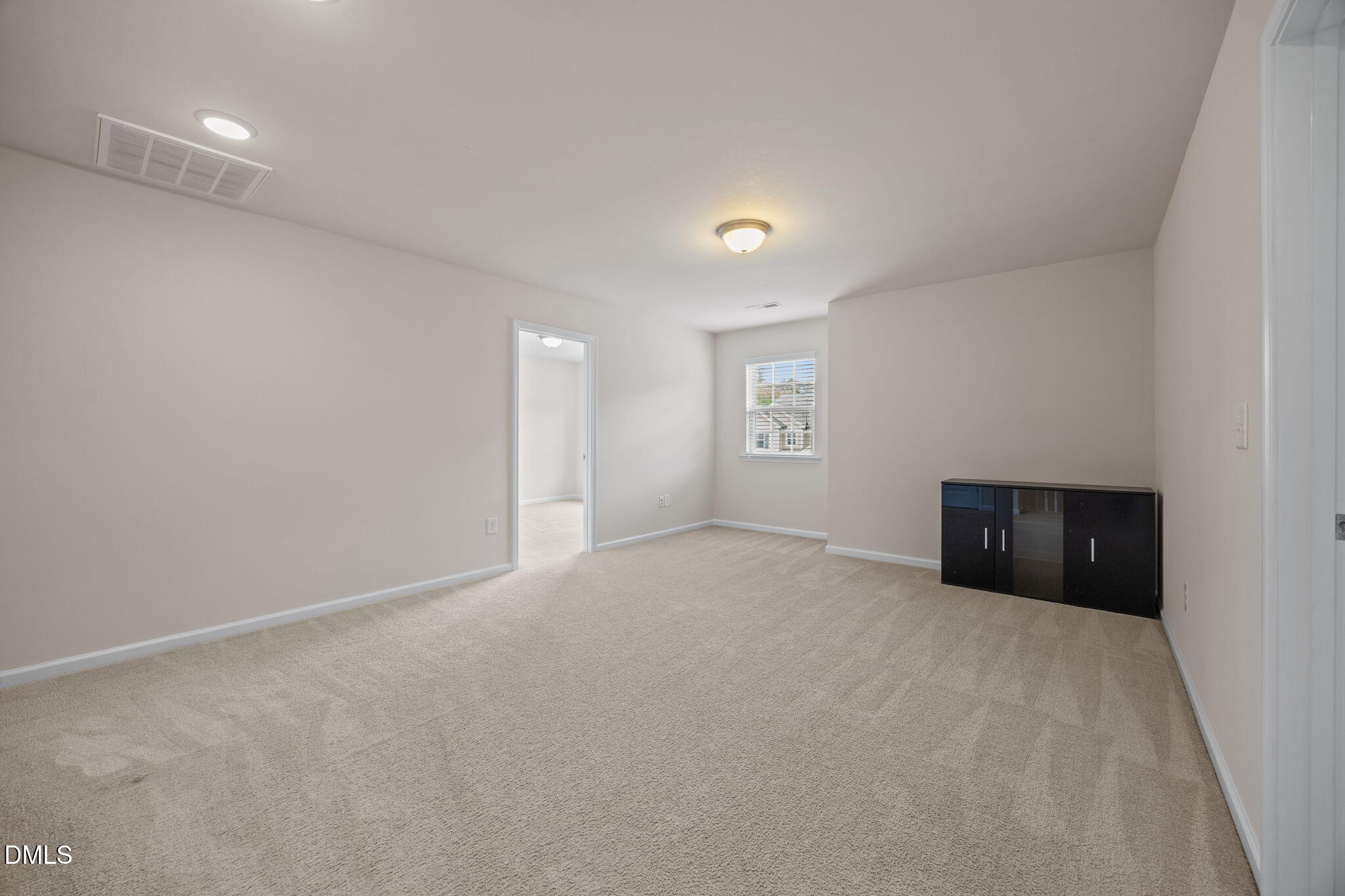 2048 Crampton Grove Way Cary, NC 27519 - Photo 41 of 50 a view of an empty room with a window