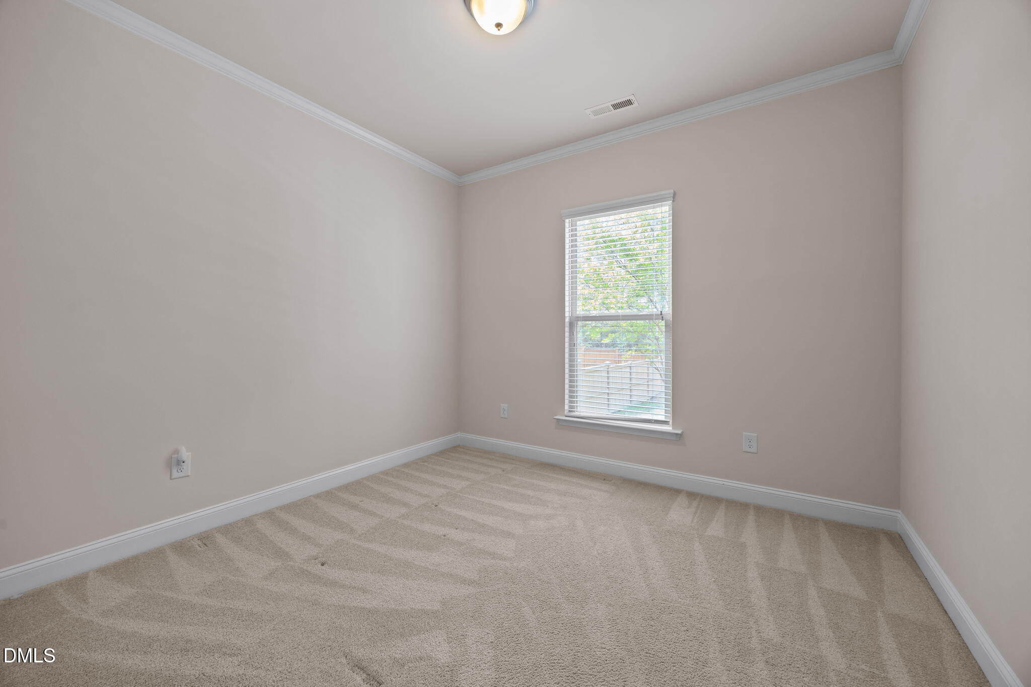 2048 Crampton Grove Way Cary, NC 27519 - Photo 44 of 50 an empty room with a window