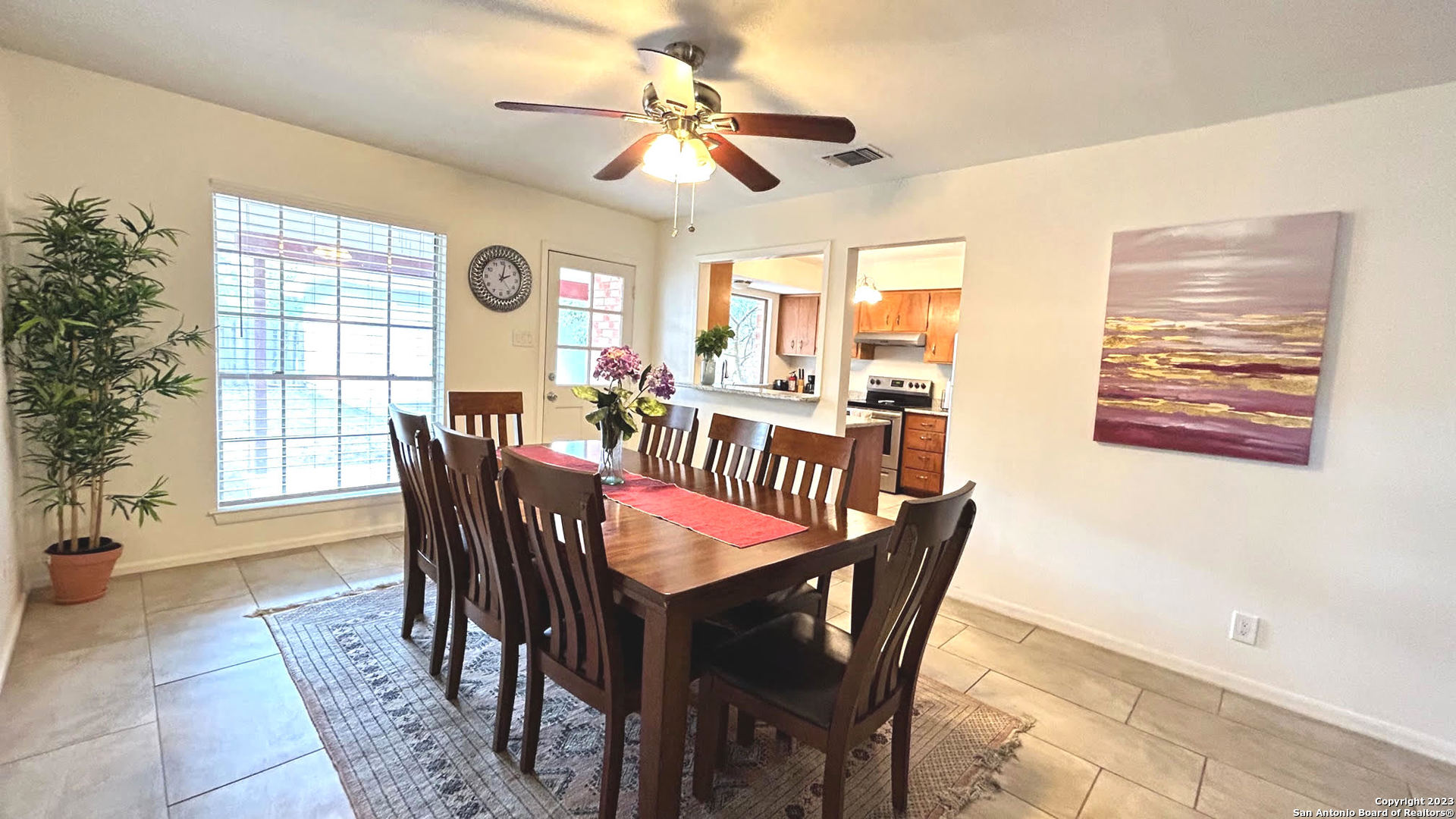 6216 Rue Marielyne Street Leon Valley, TX 78238 - Photo 7 of 35 a view of a dining room with furniture window and outside view