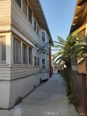 a view of a house with a street