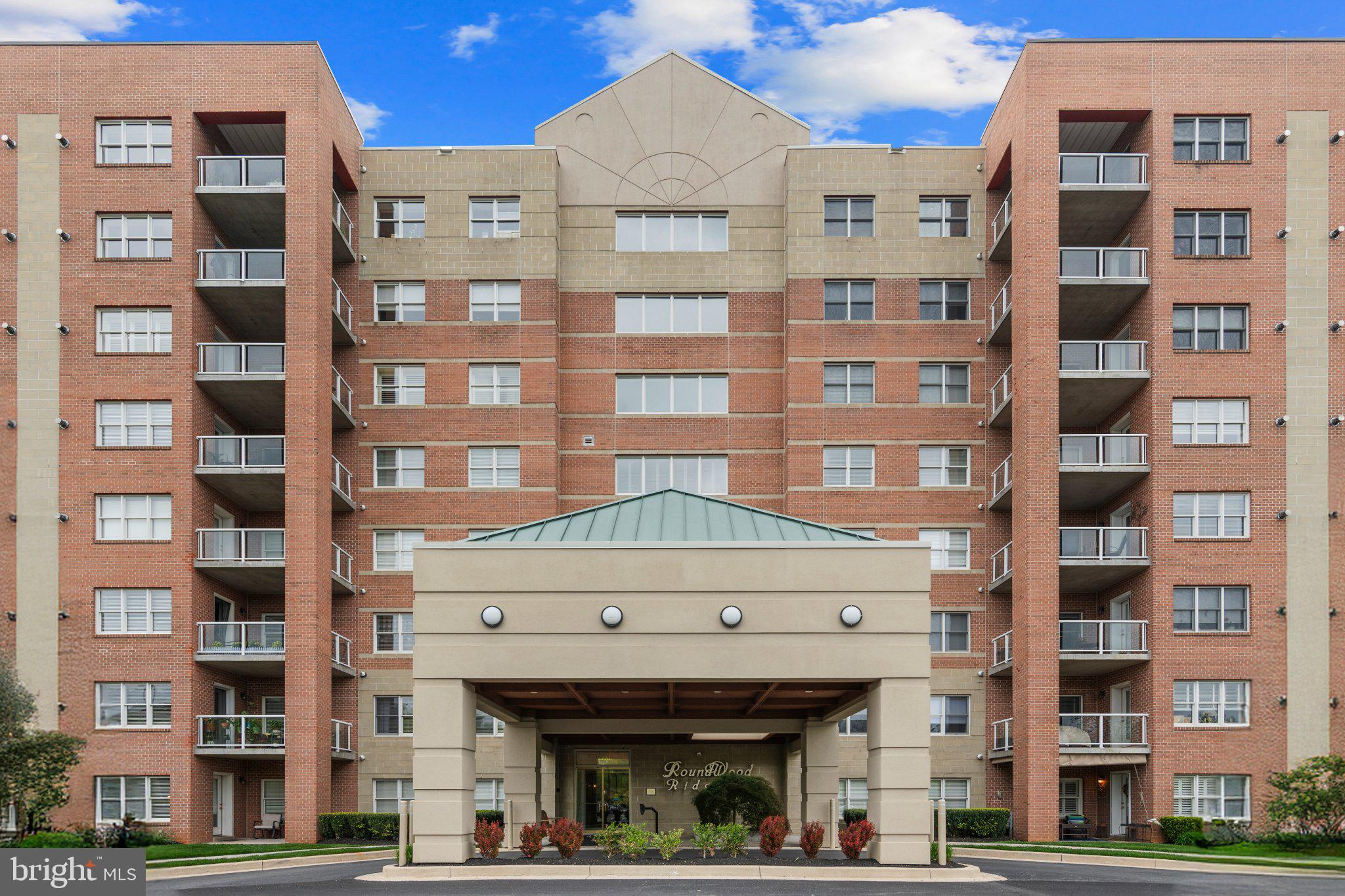 12236 Roundwood Road, Unit 609 Lutherville-Timonium, MD 21093 - Photo 2 of 40 a front view of a building