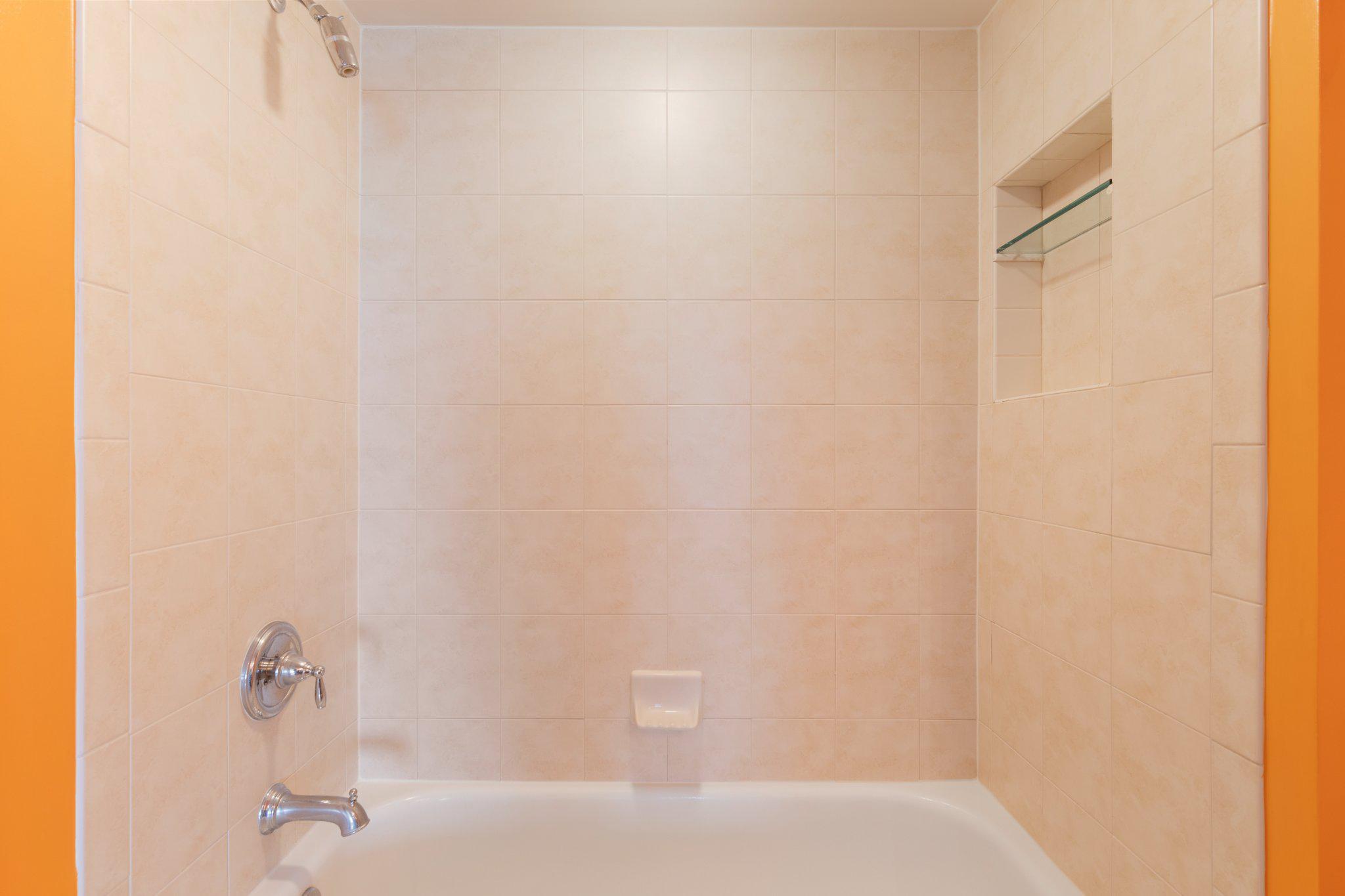 12236 Roundwood Road, Unit 609 Lutherville-Timonium, MD 21093 - Photo 24 of 40 a bathroom with a bathtub