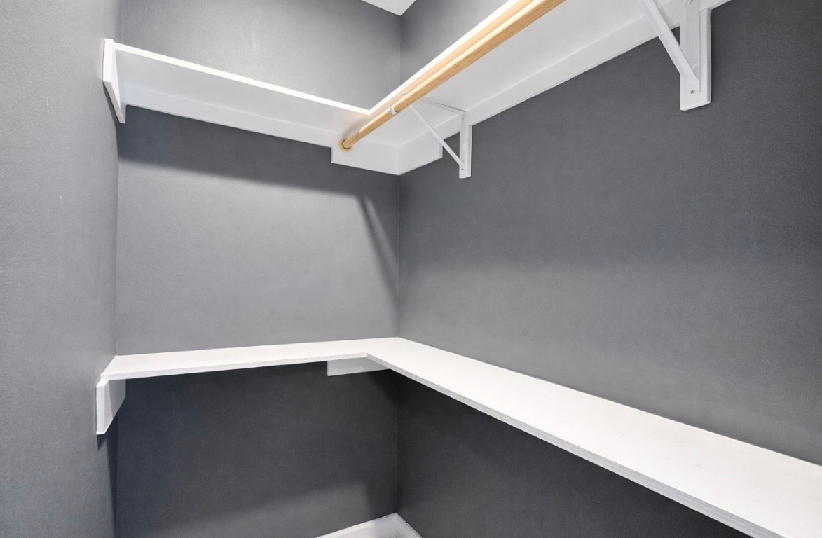 5125 Larkspur Street Houston, TX 77033 - Photo 26 of 33 a view of an empty walk in closet
