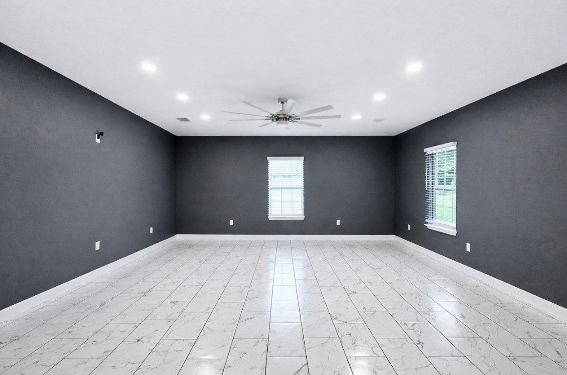 5125 Larkspur Street Houston, TX 77033 - Photo 9 of 33 a view of an empty room and window