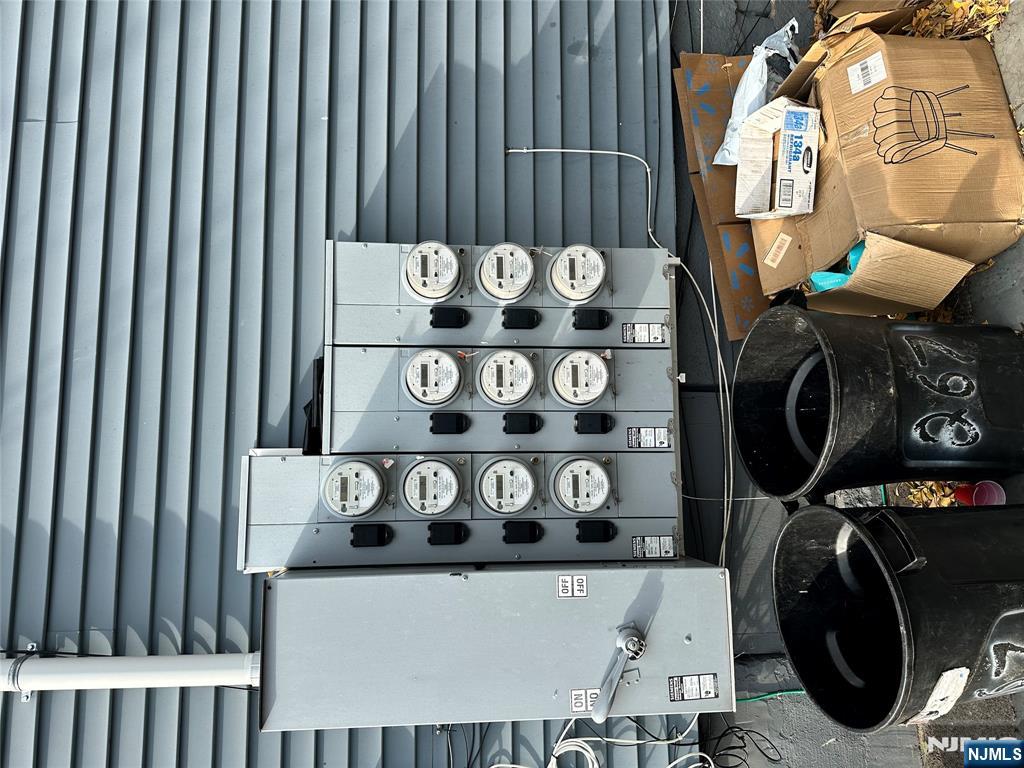 276 Ellison Street Paterson, NJ 07501 - Photo 4 of 22 a kitchen with a stove and cabinets