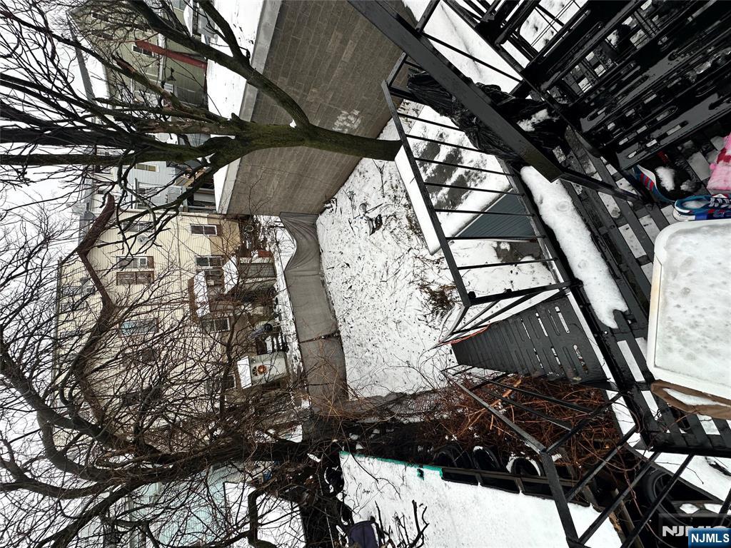 276 Ellison Street Paterson, NJ 07501 - Photo 5 of 22 a view of a house with backyard