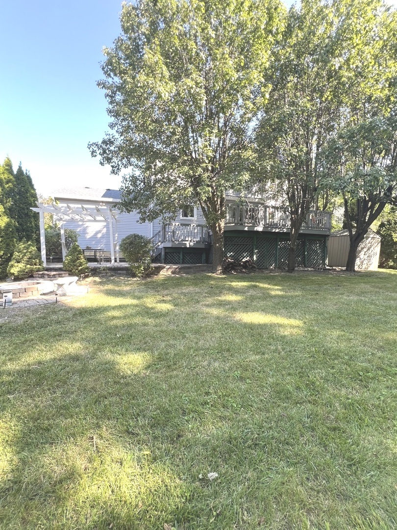 1018 Rain Tree Drive Bolingbrook, IL 60440 - Photo 21 of 22 a view of a swimming pool with an outdoor space