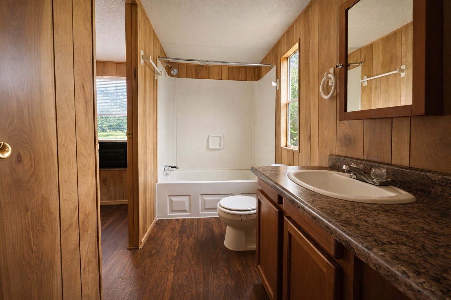 1037 Pecan Valley Road Wharton, TX 77488 - Photo 10 of 17 a bathroom with a granite countertop sink toilet and shower