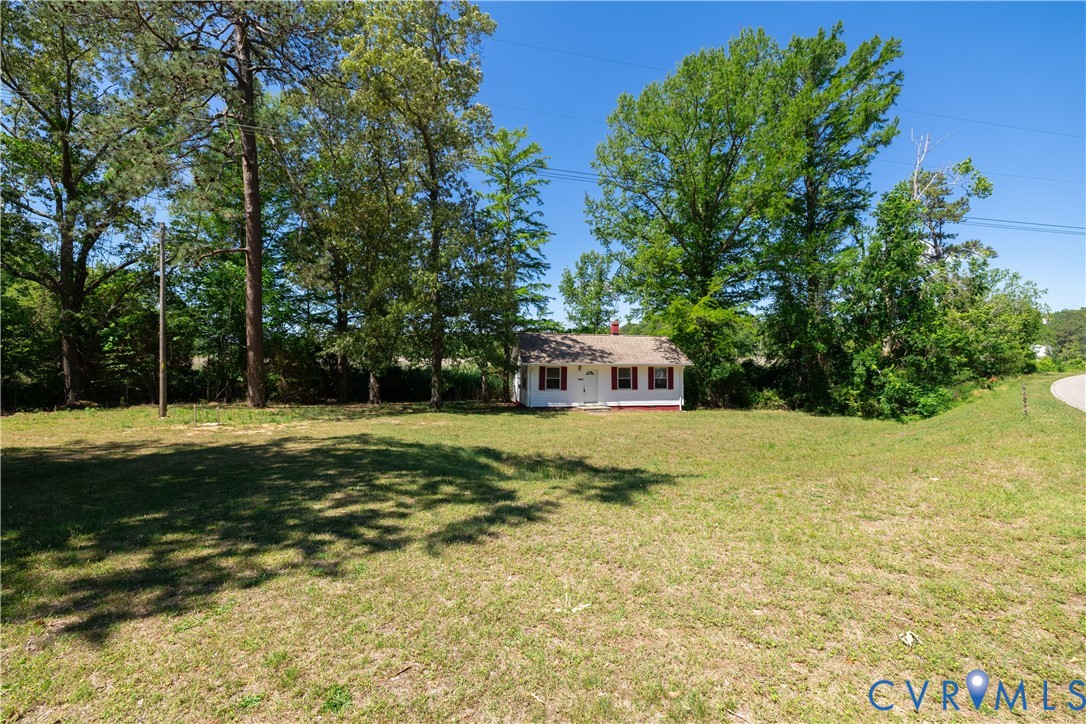 933 Pleasant Point Road Surry, VA 23883 - Photo 28 of 45 a house view with a garden space