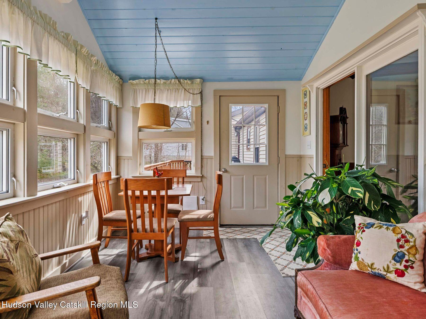 382 Cairo Junction Road Catskill, NY 12414 - Photo 19 of 38 a dining room with furniture window and wooden floor