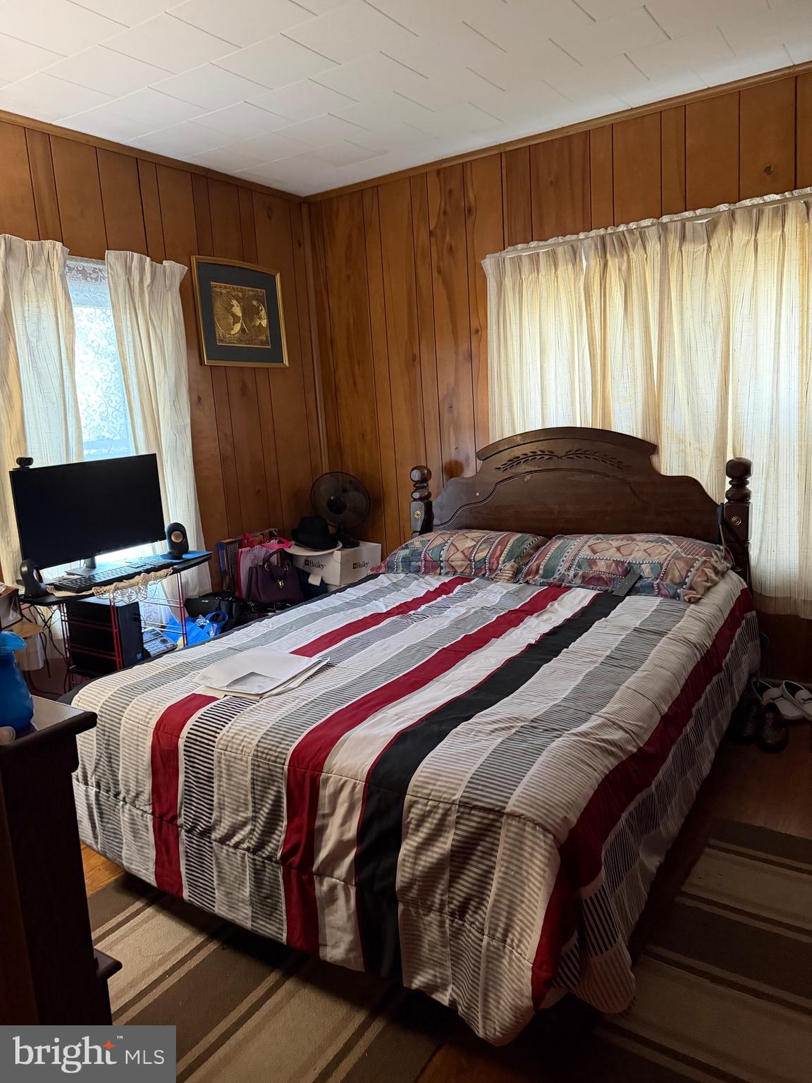 647 Highway 45 Mannington, NJ 08079 - Photo 9 of 16 a bedroom with a bed and a window