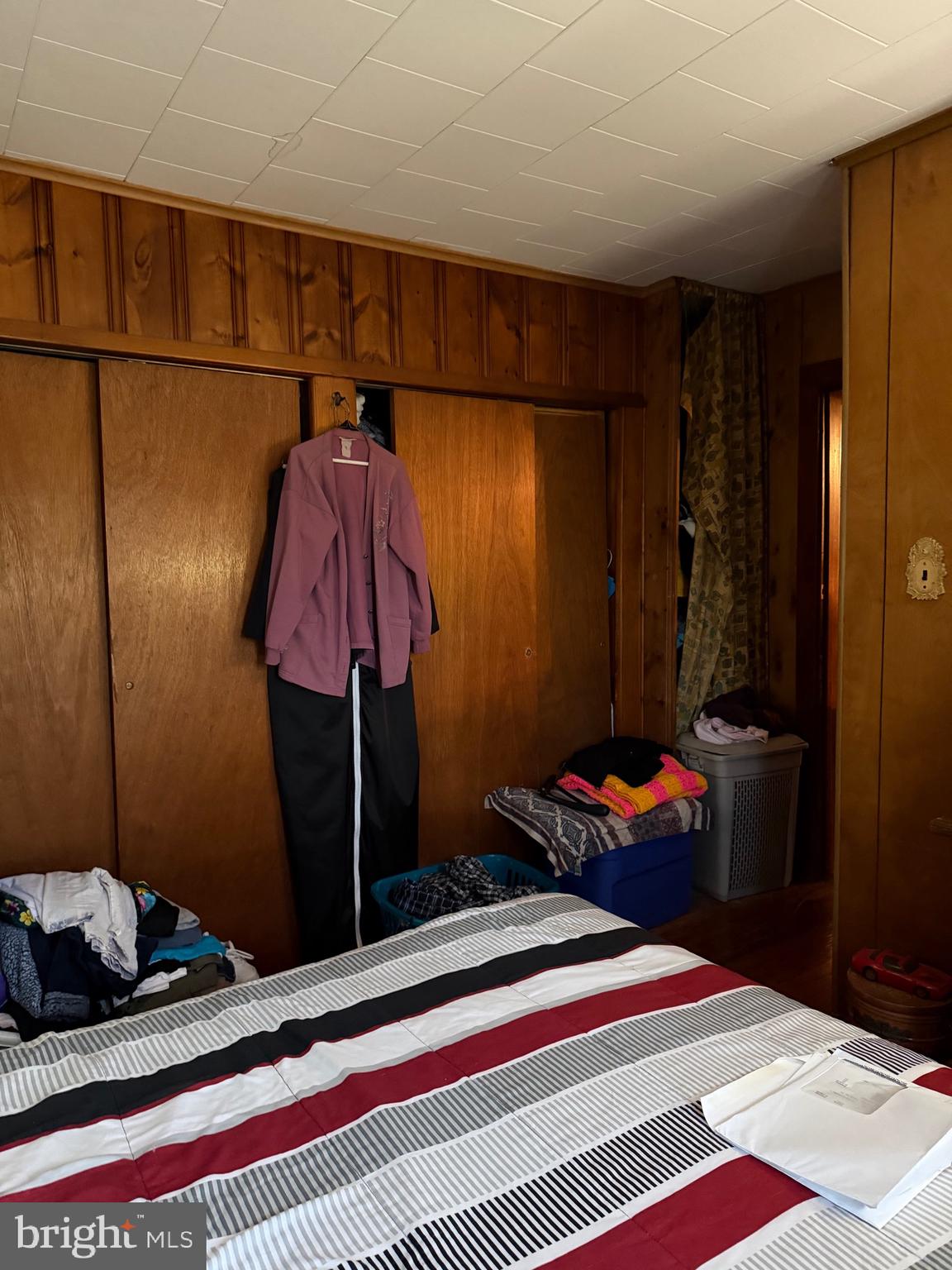 647 Highway 45 Mannington, NJ 08079 - Photo 10 of 16 a bedroom with a bed and a closet