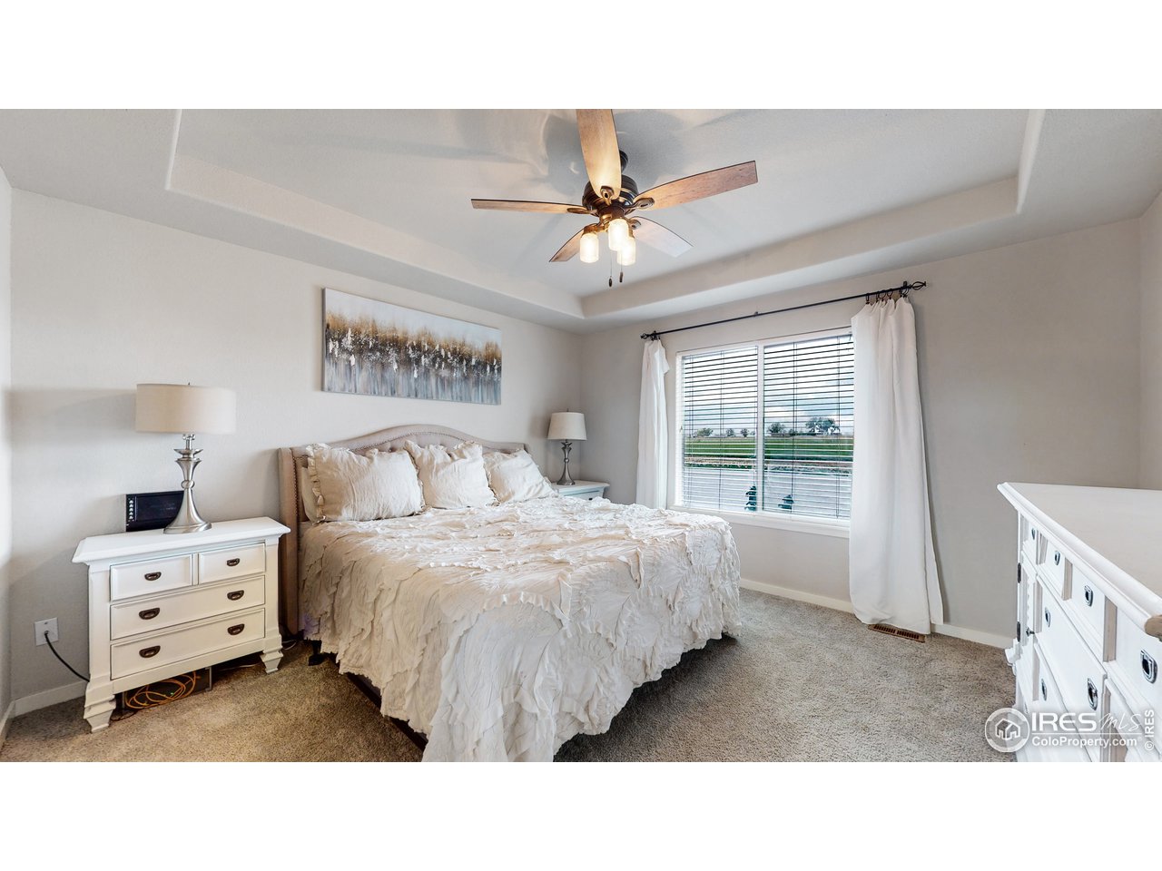 640 Rock Road Eaton, CO 80615 - Photo 12 of 33 Spacious master bedroom with new carpet and coffered ceiling