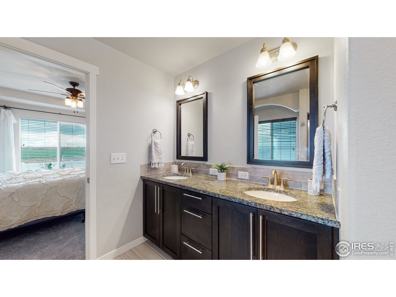 640 Rock Road Eaton, CO 80615 - Photo 17 of 33 Undermount sinks and tile backsplash