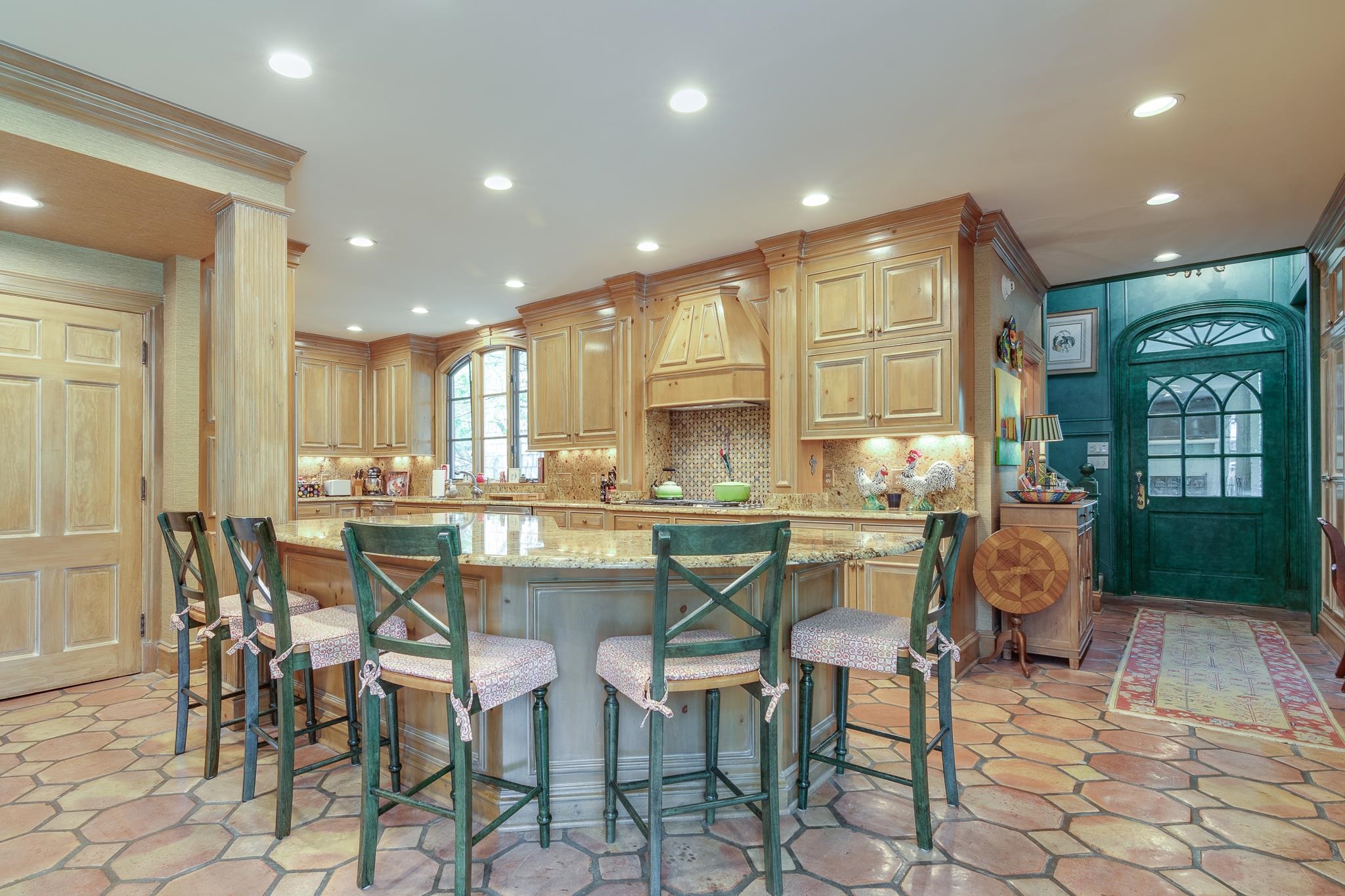 54 South Rose Road Memphis, TN 38117 - Photo 23 of 40 a large kitchen with a table and chairs