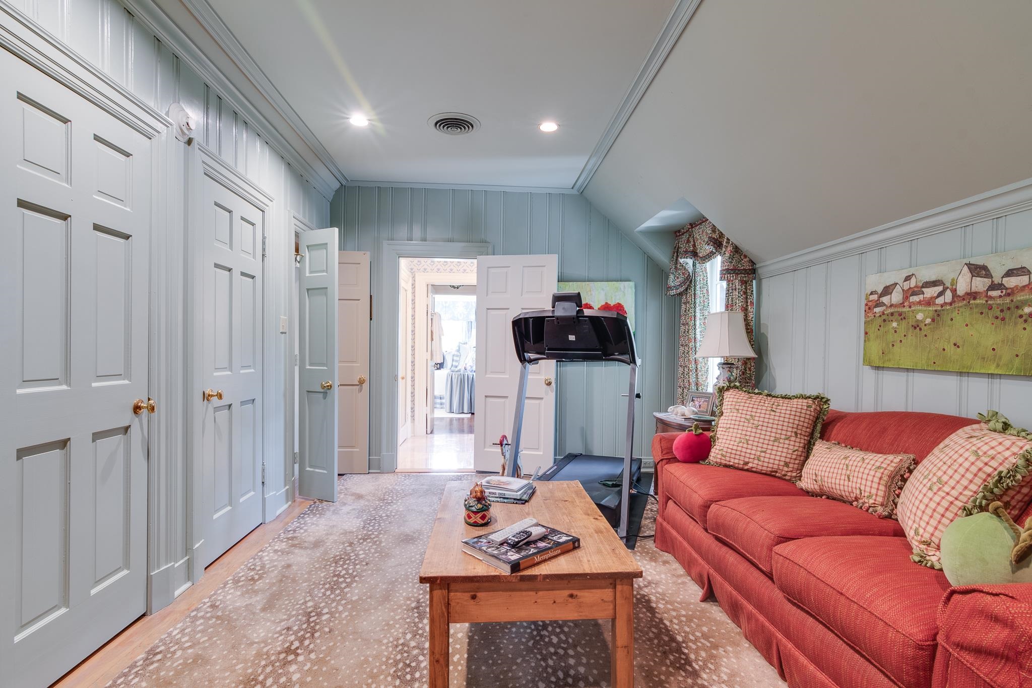 54 South Rose Road Memphis, TN 38117 - Photo 28 of 40 a living room with furniture and a flat screen tv