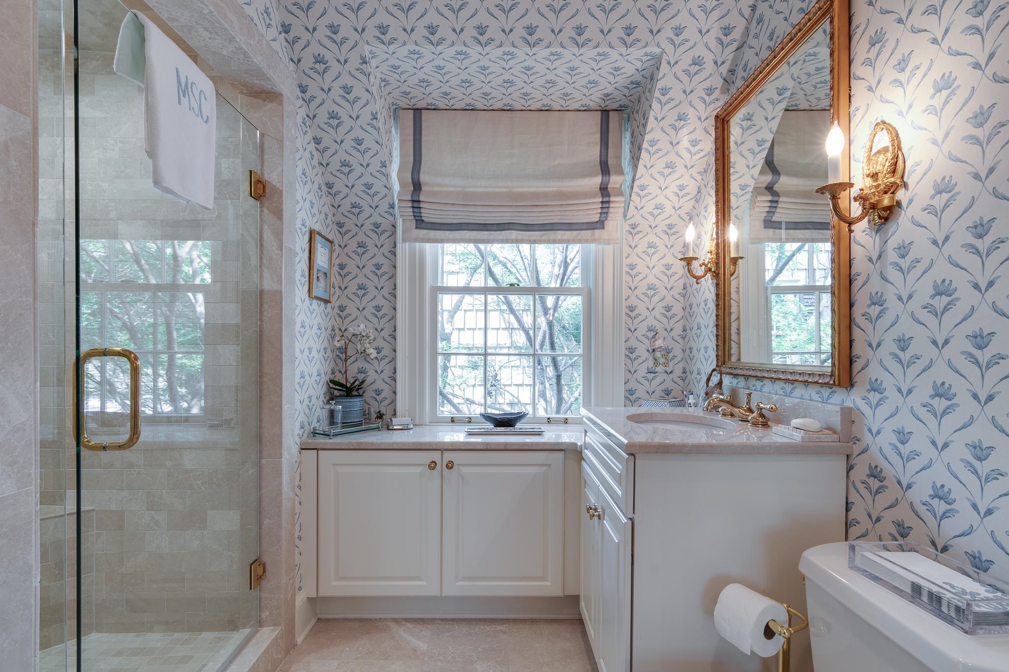 54 South Rose Road Memphis, TN 38117 - Photo 29 of 40 a bathroom with a sink and a mirror