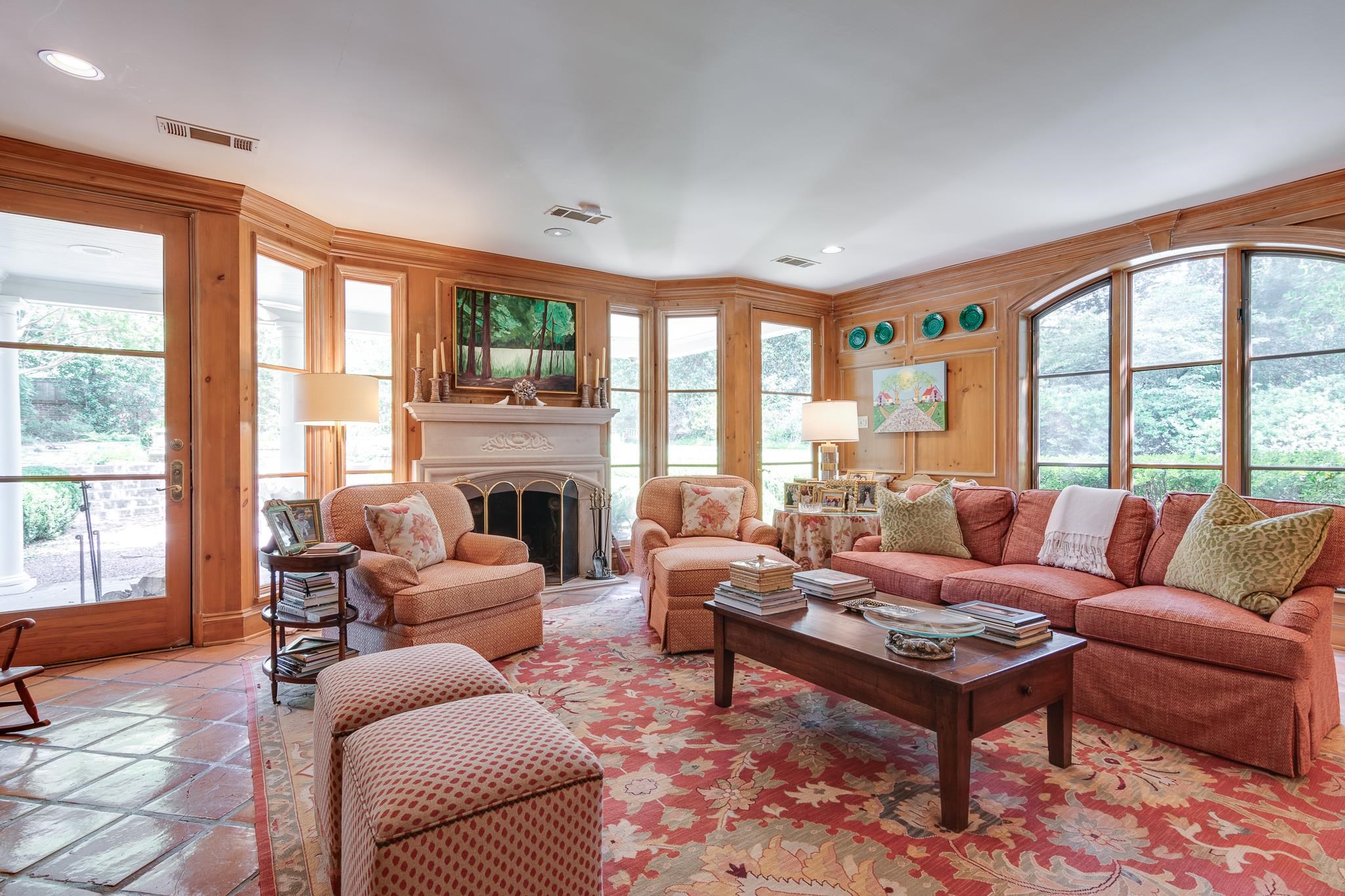 54 South Rose Road Memphis, TN 38117 - Photo 40 of 40 a living room with furniture large windows and a fireplace