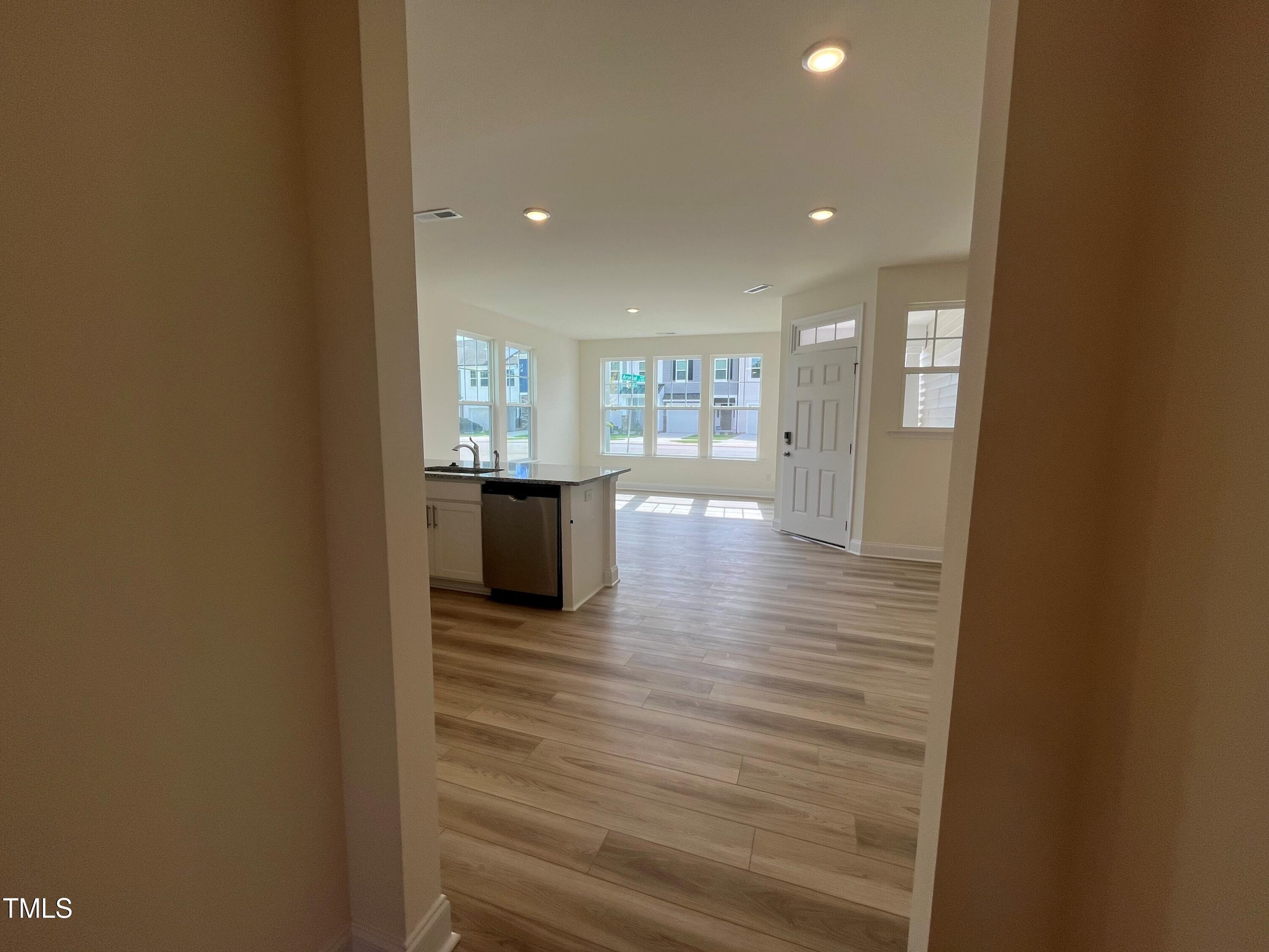 6129 Arsenal Avenue Raleigh, NC 27610 - Photo 13 of 34 Back Hallway leaving kitchen