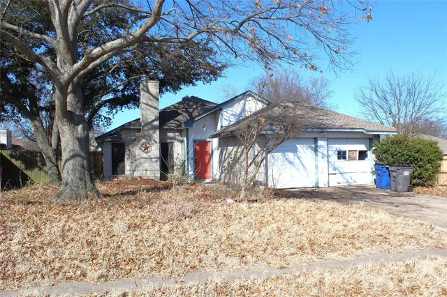 a view of a house with a snow in the yard