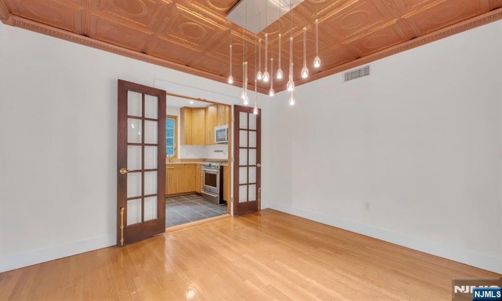 278 Maple Street Haworth, NJ 07641 - Photo 11 of 37 a view of an empty room with a window