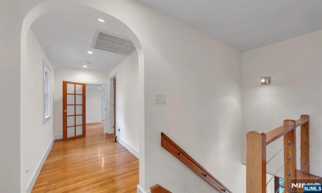 278 Maple Street Haworth, NJ 07641 - Photo 23 of 37 a view of a hallway with entryway and wooden floor