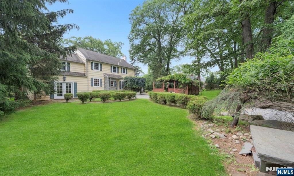 278 Maple Street Haworth, NJ 07641 - Photo 35 of 37 a front view of a house with a yard