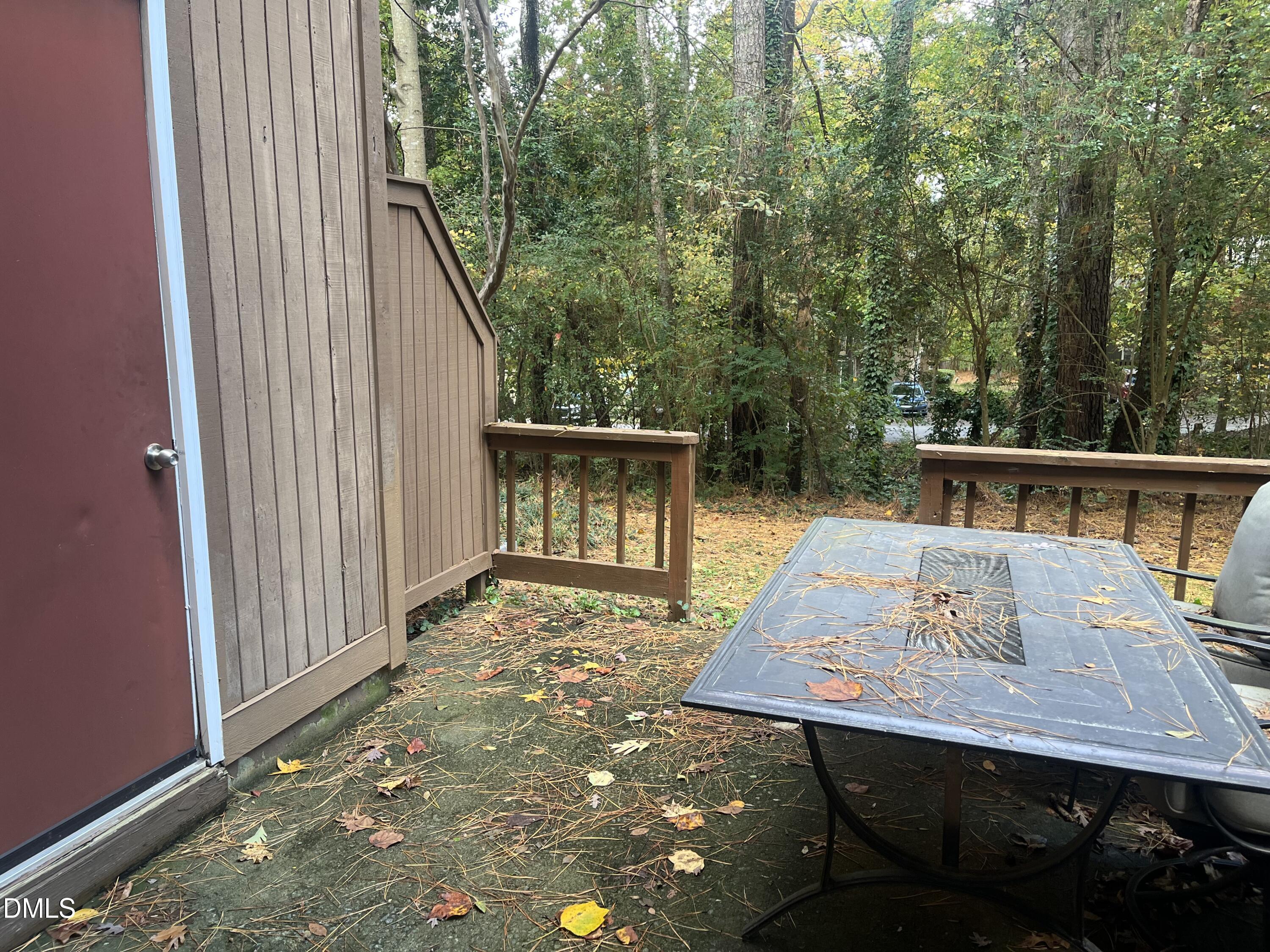 4307 Southwind Drive Raleigh, NC 27613 - Photo 15 of 15 a view of balcony with wooden floor and seating space