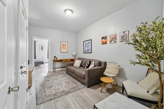 a living room with furniture and a couch