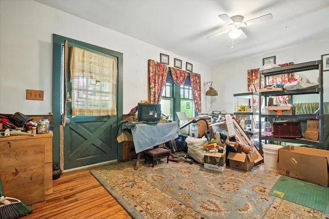 a bathroom with a toilet a sink and a mirror