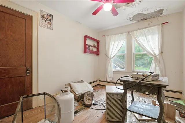 a outdoor living space with patio furniture and a window
