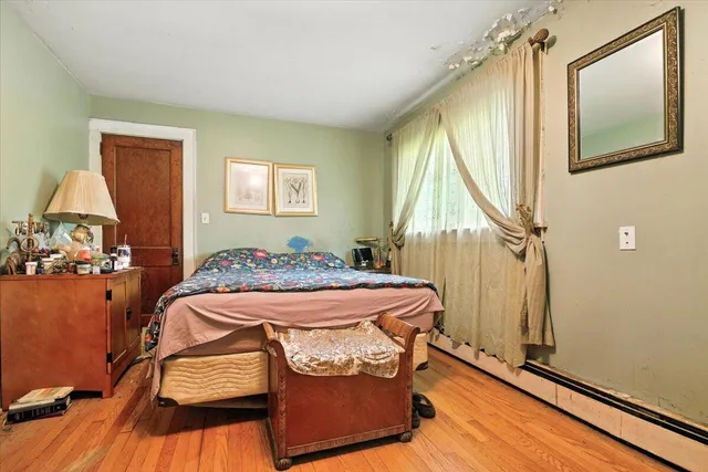 a room with furniture and wooden floor