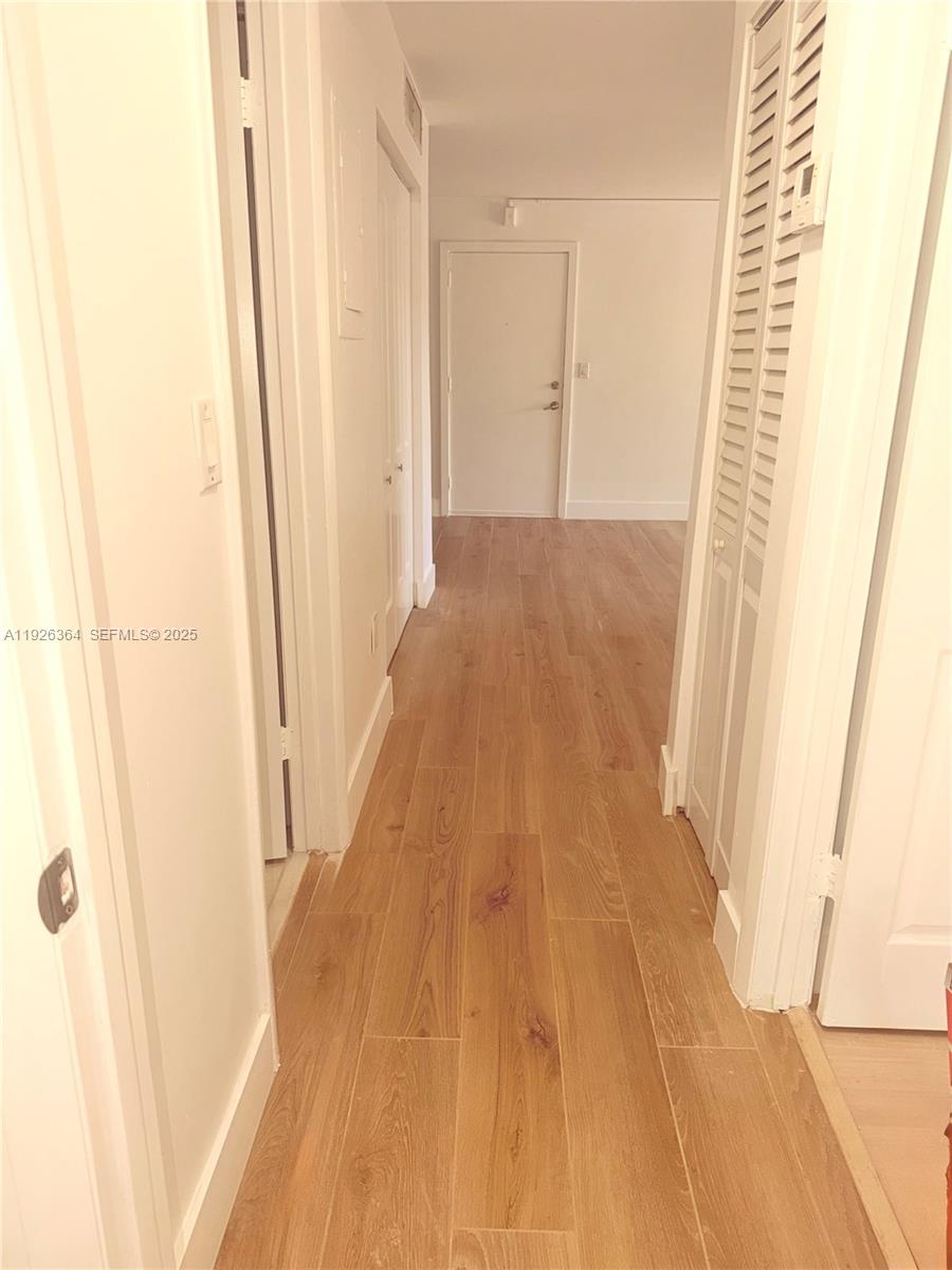 7208 Fairway Drive, Unit I20 Miami Lakes, FL 33014 - Photo 9 of 22 a view of a hallway