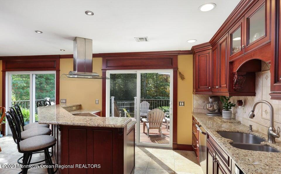 245 Delaware Trail Jackson, NJ 08527 - Photo 13 of 43 a kitchen with a granite countertop sink stove and cabinets