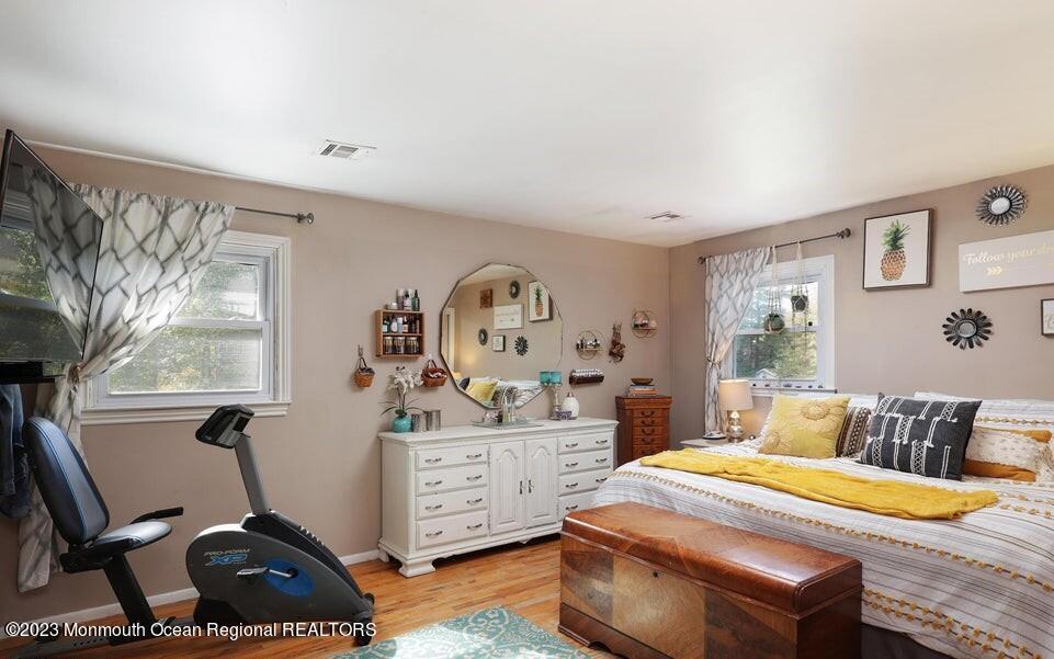 245 Delaware Trail Jackson, NJ 08527 - Photo 24 of 43 a bedroom with furniture and a window