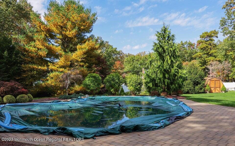 245 Delaware Trail Jackson, NJ 08527 - Photo 30 of 43 a view of a garden with an outdoor space