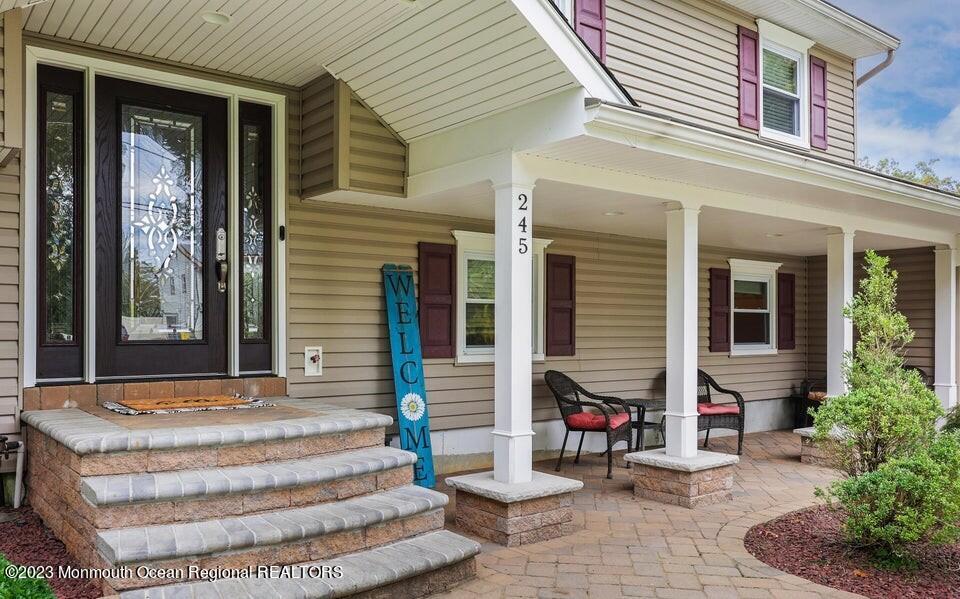 245 Delaware Trail Jackson, NJ 08527 - Photo 3 of 43 a view of house with an outdoor space and seating space