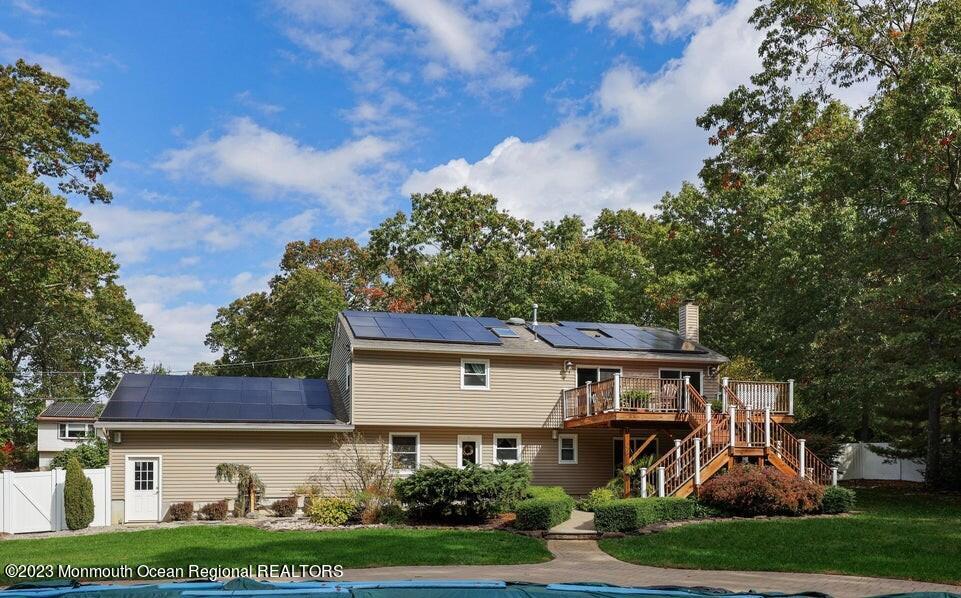 245 Delaware Trail Jackson, NJ 08527 - Photo 31 of 43 a view of a big house with garden and plants